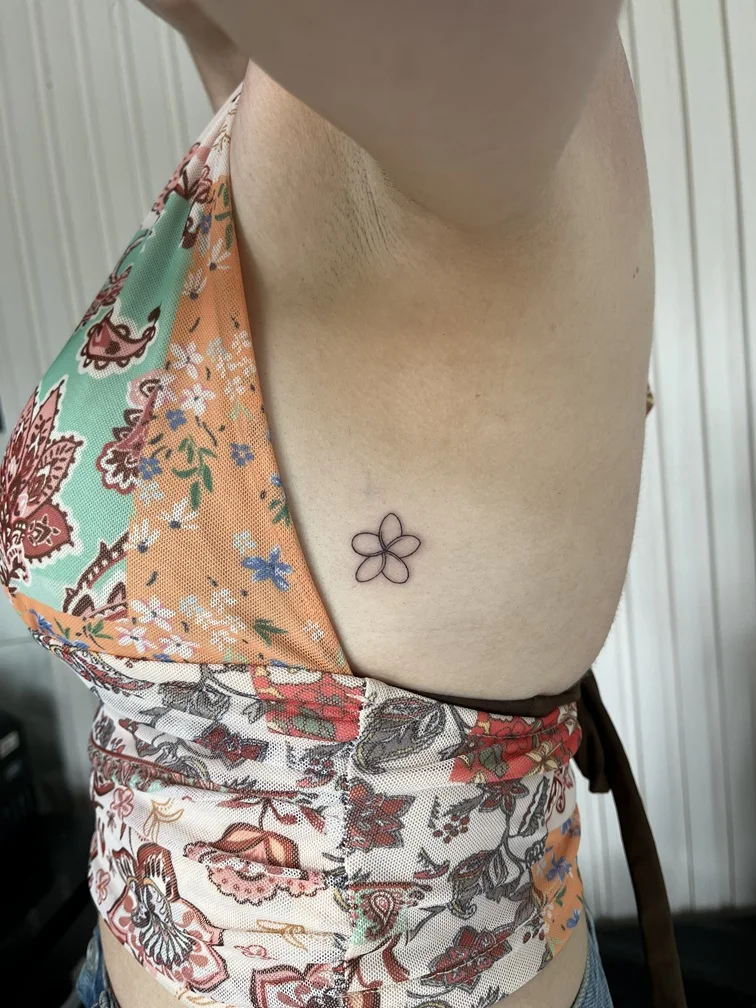 woman waist flower small minimalist fine line line work line tattoo canggu bali