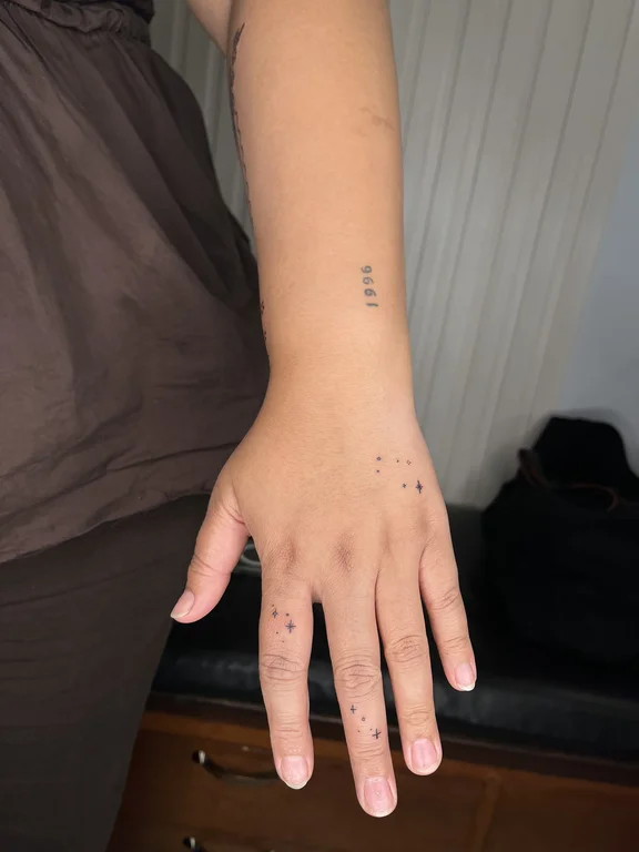 geometric minimalist hand fine line minimal thin line elegant dotwork tattoo Canggu Bali