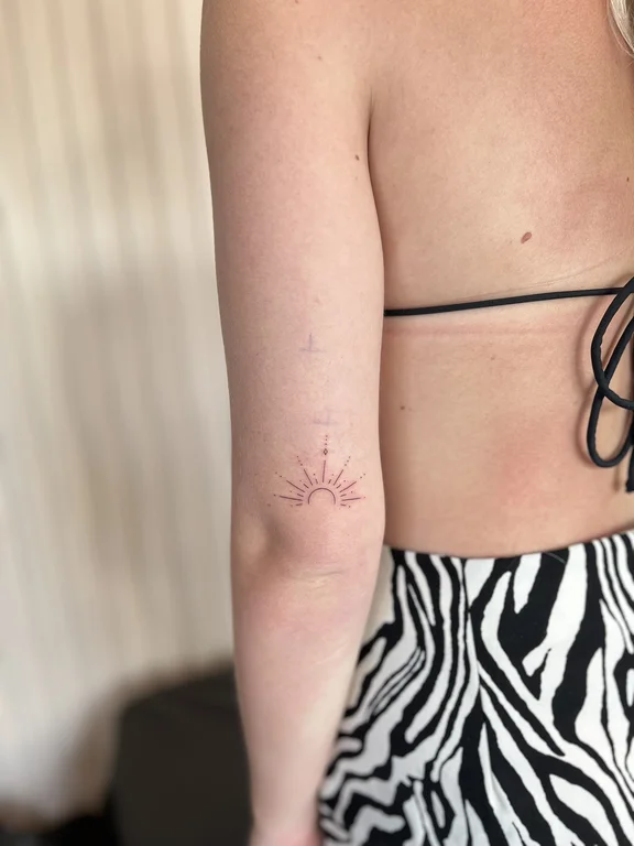 geometric minimalist lotus fine line minimal spiritual sun linework tattoo Canggu Bali