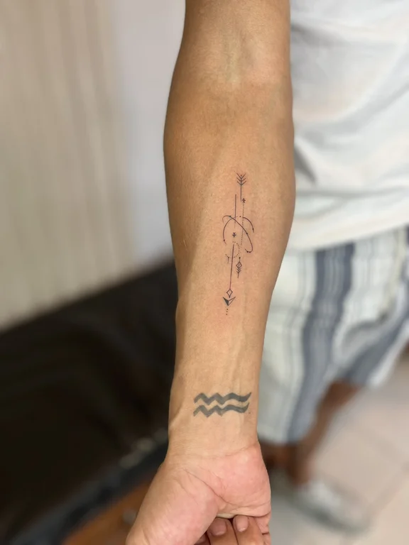 abstract minimalist man fine line wave bold line thin line minimal tattoo Canggu Bali