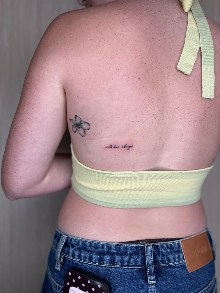 woman back lettering minimalist small fineline fine line linework line tattoo canggu bali
