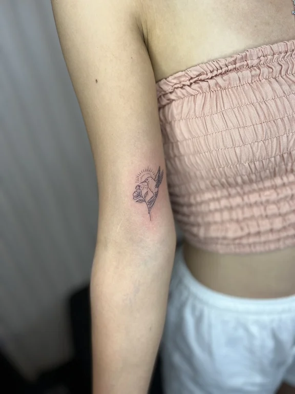 nature minimalist woman soft shading minimal elegant fine line flower tattoo Canggu Bali