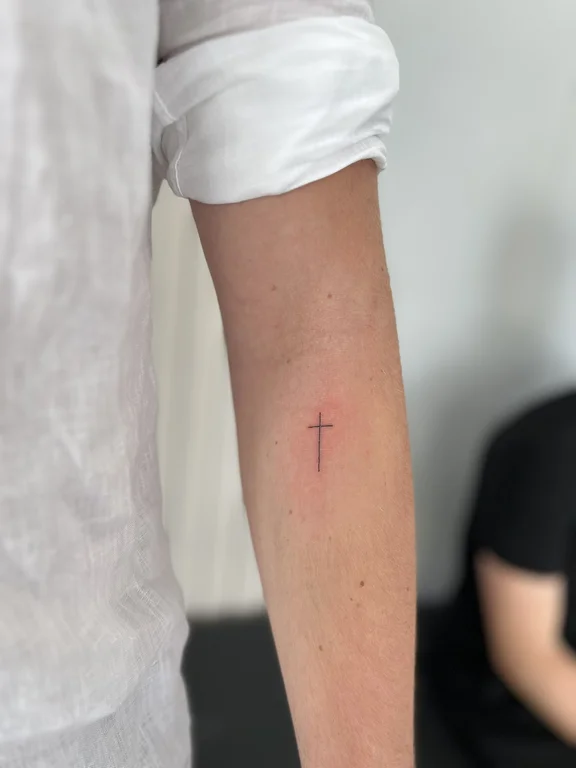 religious minimalist man fine line minimal spiritual soft shading bold line tattoo Canggu Bali