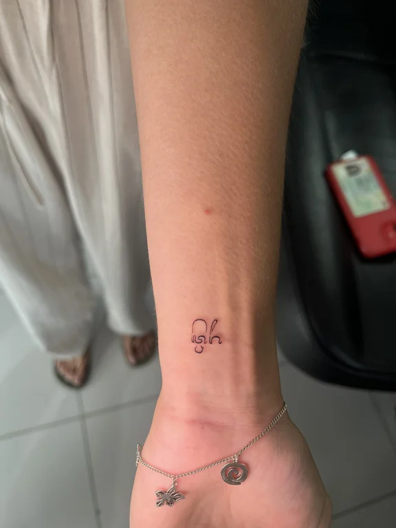 symbol minimalist butterfly fine line minimal bold line thin line elegant tattoo Canggu Bali