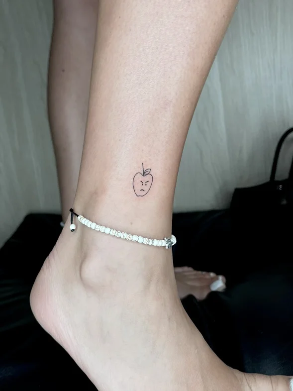 woman apple foot small symbol minimalist fine line fineline linework line tattoo canggu bali