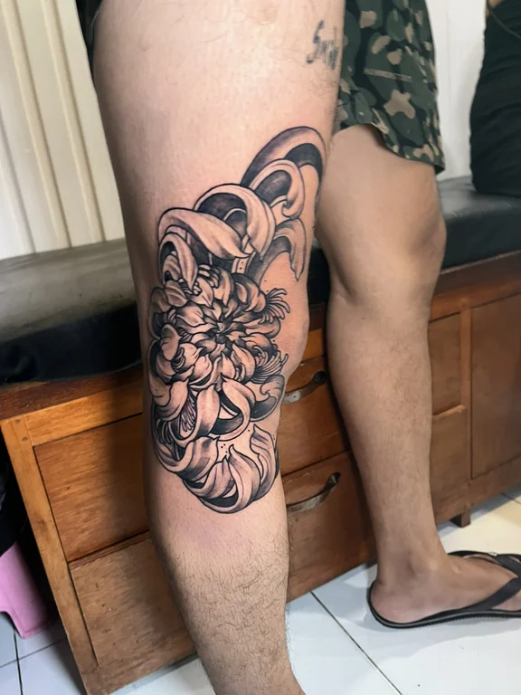 floral neo traditional peony linework elegant dotwork heavy shading balinese pattern tattoo Canggu Bali