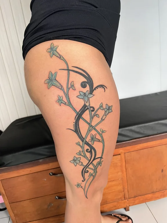 floral neo traditional woman linework elegant fine line flower mystical tattoo Canggu Bali