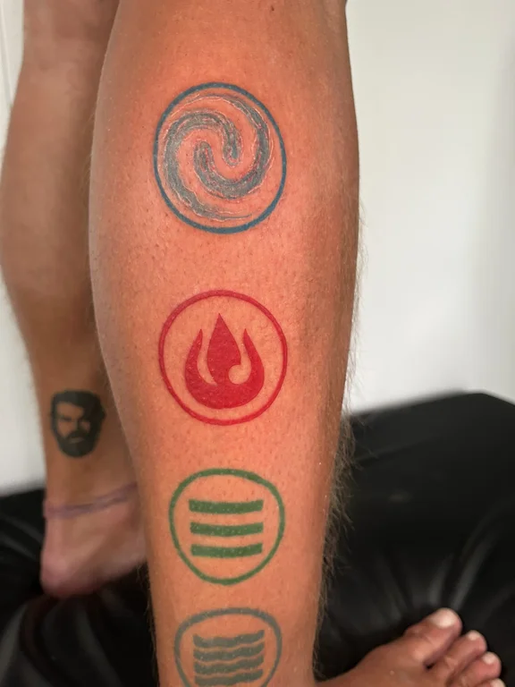 symbol neo traditional deity colorful fire spiritual bold line fine line tattoo Canggu Bali