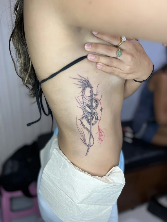 abstract new school dragon fine line elegant demon linework woman tattoo Canggu Bali