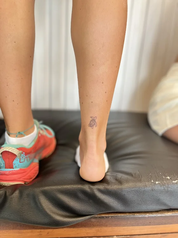 abstract new school lotus fine line sun minimal moon soft shading tattoo Canggu Bali