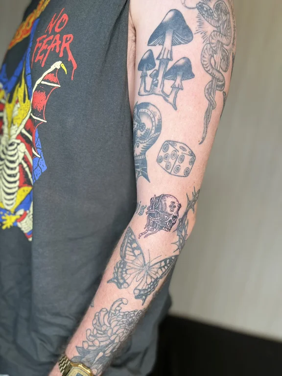 abstract new school man black grey cloud linework heavy shading horror tattoo Canggu Bali