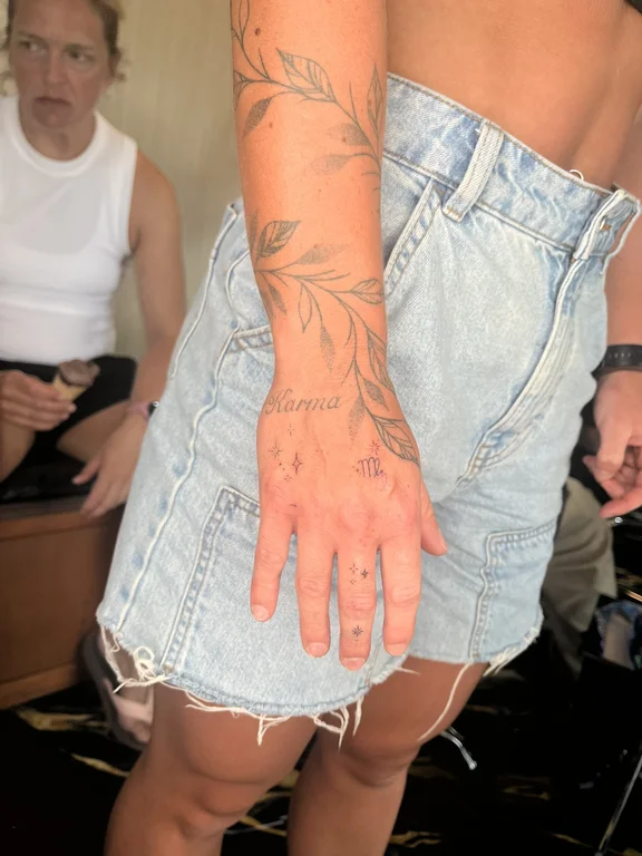 floral new school hand linework minimal leaf elegant fine line tattoo Canggu Bali