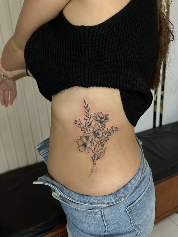 floral new school peony linework elegant soft shading fine line dotwork tattoo Canggu Bali