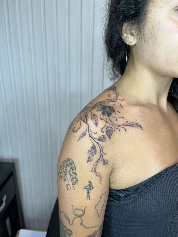 floral new school woman linework elegant flower soft shading cloud tattoo Canggu Bali