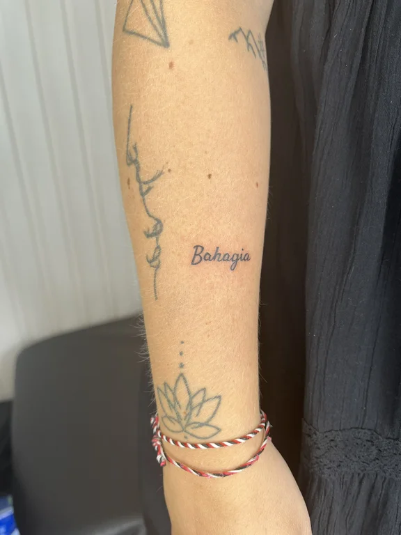lettering new school lotus bold line elegant linework fine line dotwork tattoo Canggu Bali