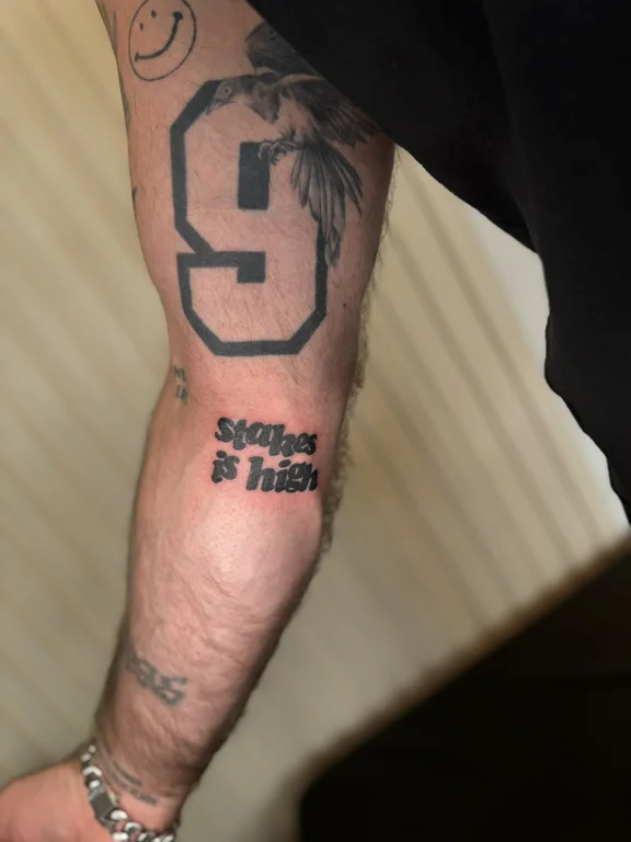 lettering new school man black grey fire heavy shading soft shading snake tattoo Canggu Bali