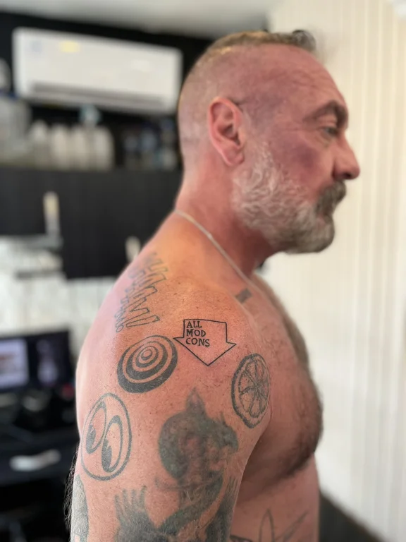 mythology new school man dotwork sun black grey linework heavy shading tattoo Canggu Bali