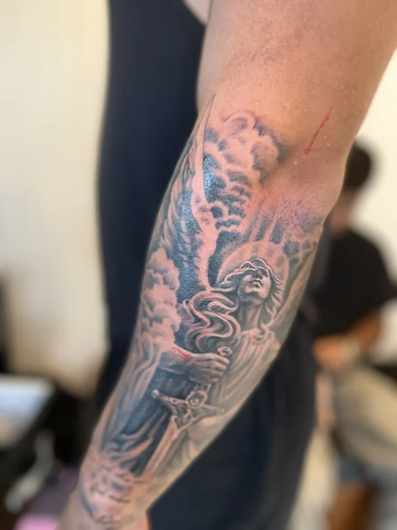 mythology new school snake heavy shading cloud smoke deity linework tattoo Canggu Bali