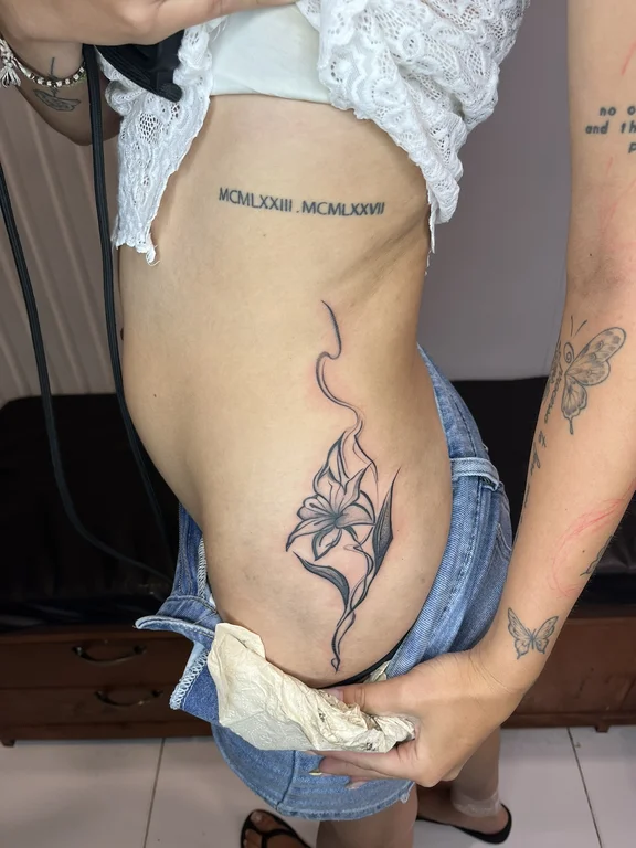 mythology new school woman linework elegant fine line wave koi tattoo Canggu Bali