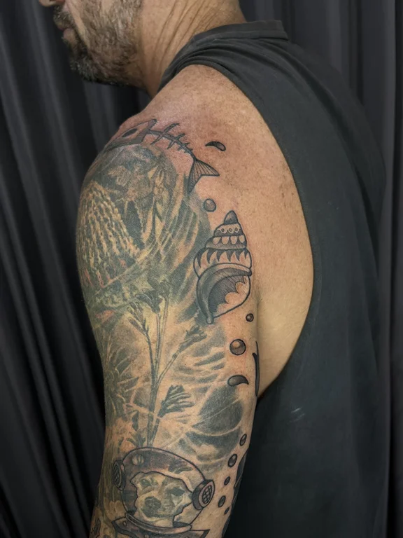 nature new school deity linework wave black grey heavy shading dotwork tattoo Canggu Bali