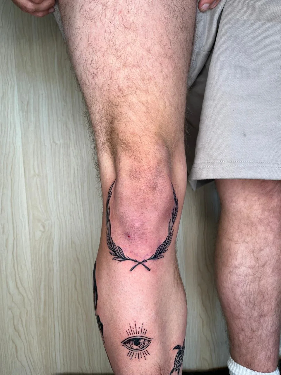 man foot leg old school symbol blackwork black tattoo canggu bali