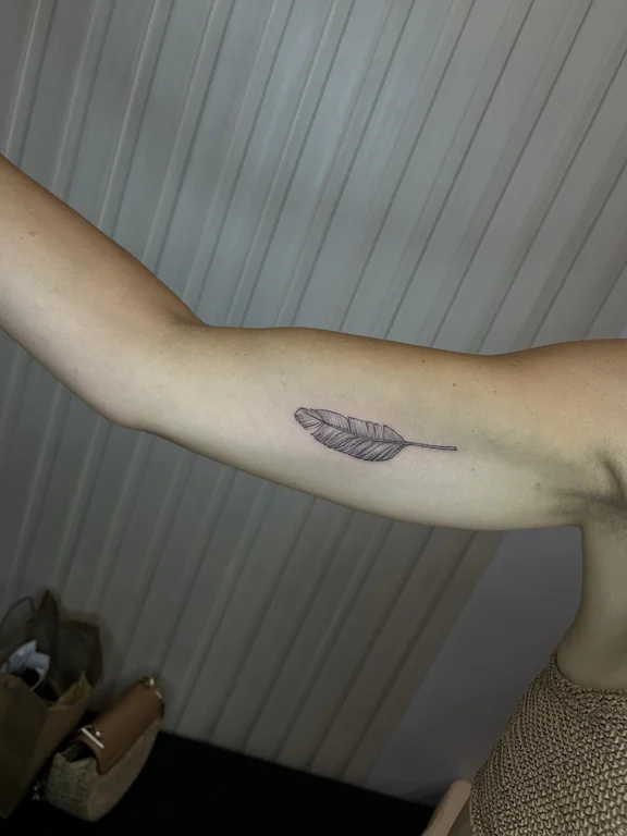 abstract minimalist angel fine line leaf dotwork soft shading black grey tattoo Canggu Bali
