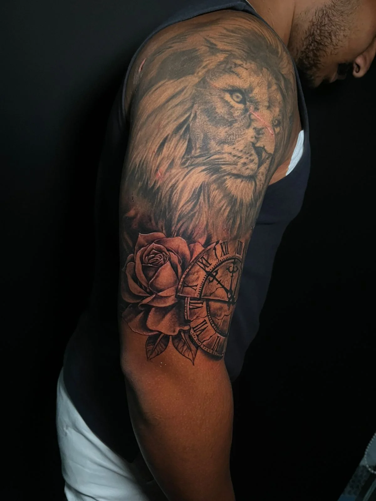 man hand clock time rose flower black grey black work shading realism tattoo canggu bali