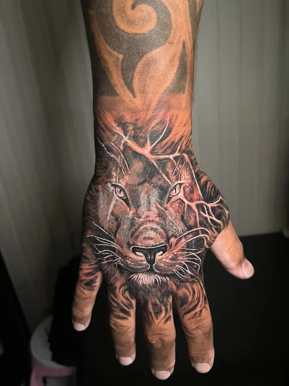 animal surreal hand black grey horror demon lion heavy shading tattoo Canggu Bali