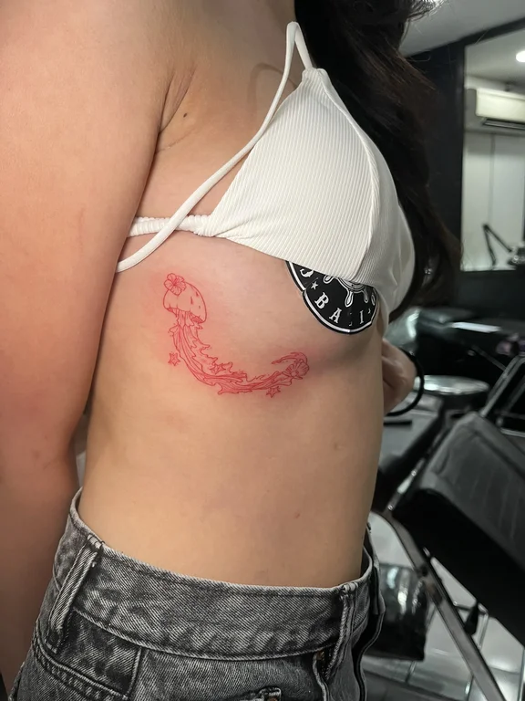 abstract fine line woman bold line fire wave linework dotwork tattoo Canggu Bali